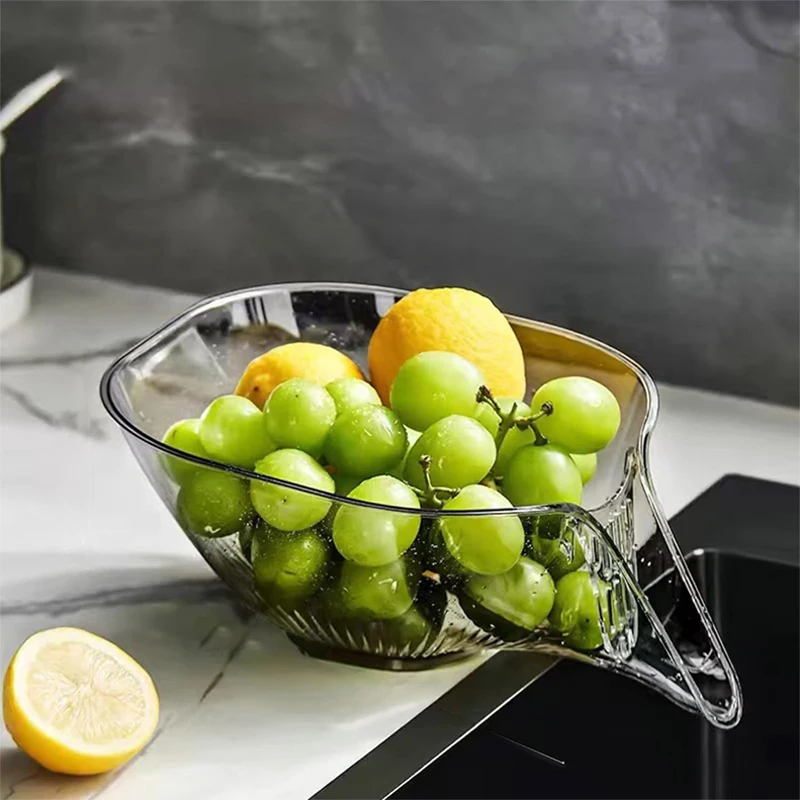 FreshBox produce basket in a modern kitchen sink