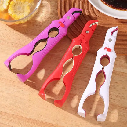Plate clips beside kitchen dishes
