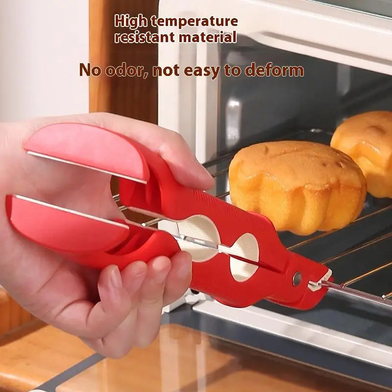 Plate clip holding a dish near an oven