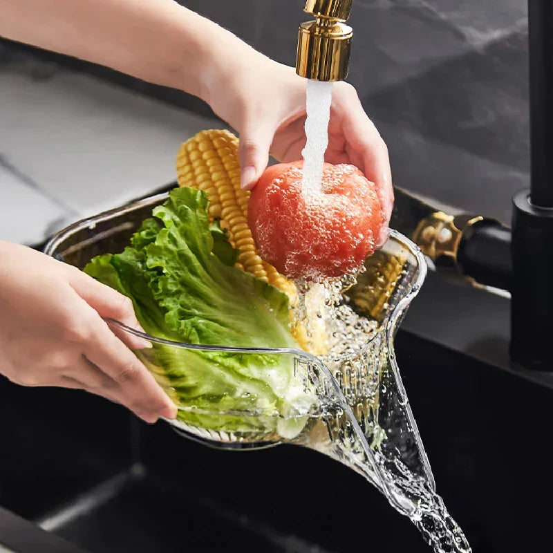Hands washing fresh vegetables in the FreshBox sink colander