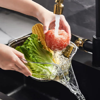 Hands washing fresh vegetables in the FreshBox sink colander