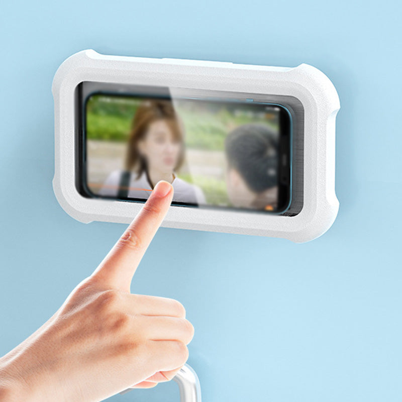 Touchscreen being used through the clear front of a shower phone holder