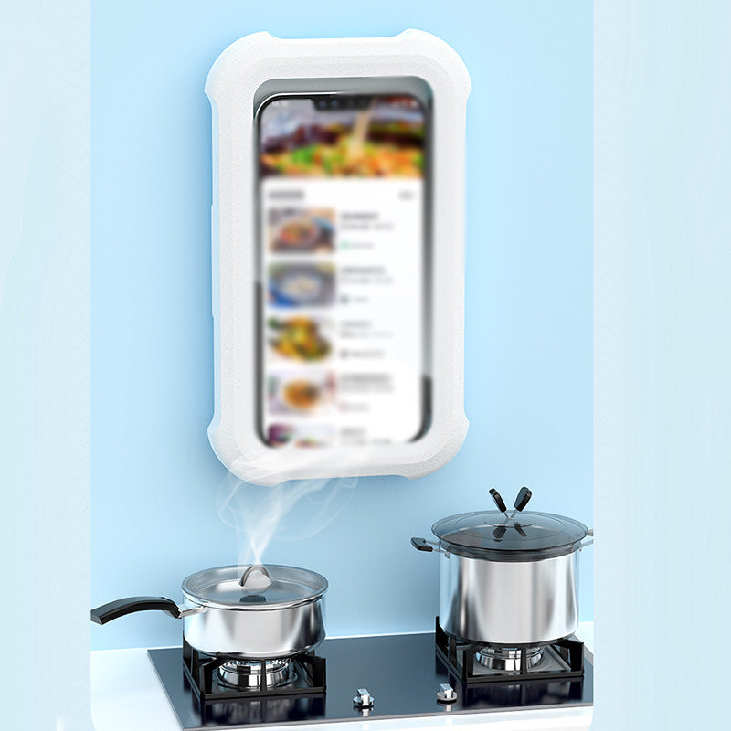 White wall-mounted phone holder used for hands-free viewing in a kitchen