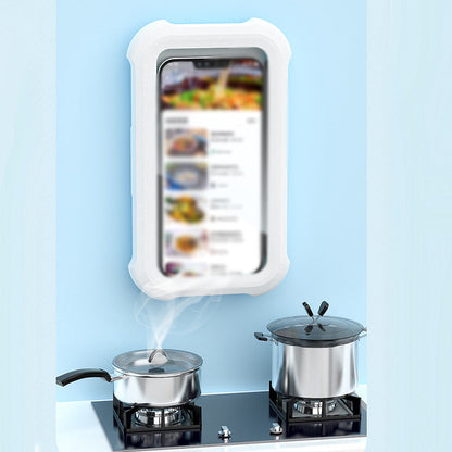 White wall-mounted phone holder used for hands-free viewing in a kitchen